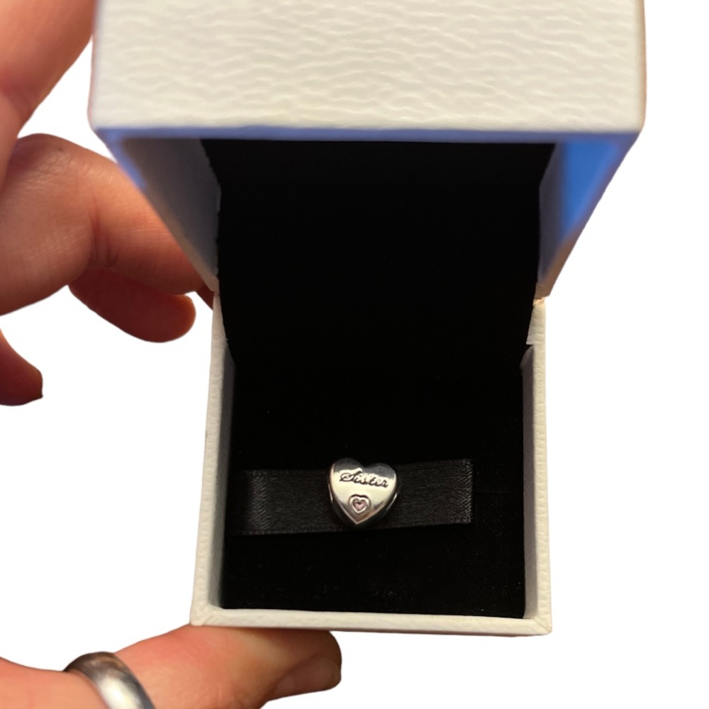 Pandora charm “sisters” pink gem